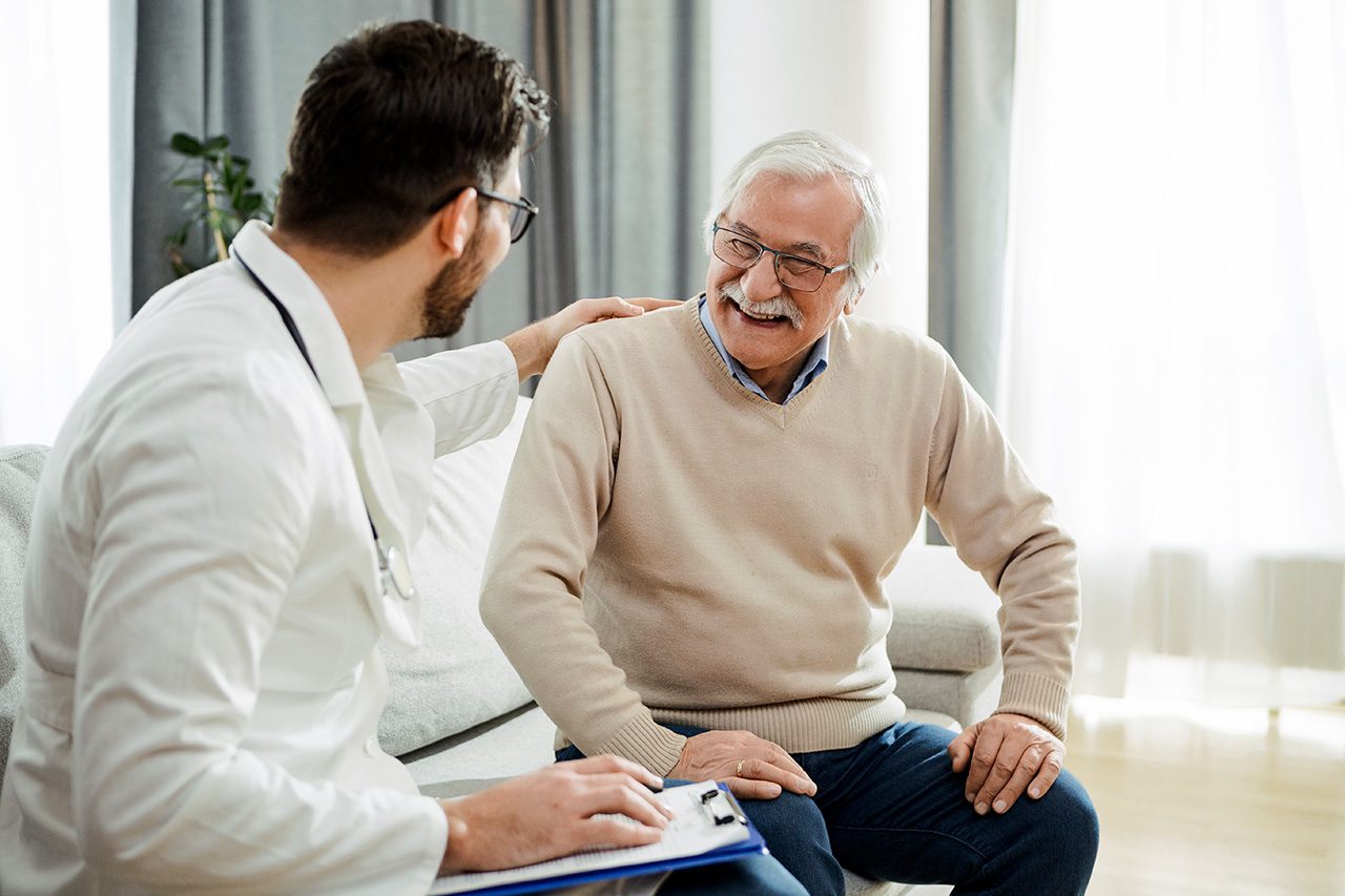 A senior citizen consulting a doctor A senior citizen consulting a doctor